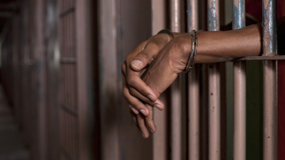 handcuff-police-istockphoto-prison-jail-e1681847741460-1424×802-1